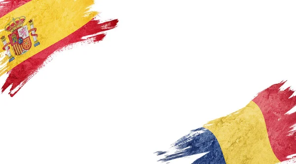 Bandeiras da Espanha e da Roménia em fundo branco — Fotografia de Stock